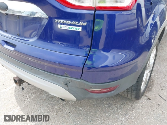 2014 Ford Escape Titanium с VIN 1FMCU0J96EUA61153, выставлен на аукционе IAAI как лот 41807295 с пробегом 159 036 миль миль и . История ставок и продаж доступна на DreamBid. Изображение 13.