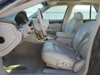 2000 Cadillac Seville Touring STS z VIN 1G6KY5495YU177352, wystawiony jako Copart lot #86020444 z przebiegiem Nie podano mil oraz Szkoda całkowita • Salvage title. Historia ofert i sprzedaży dostępna na DreamBid. Obrazek 7.