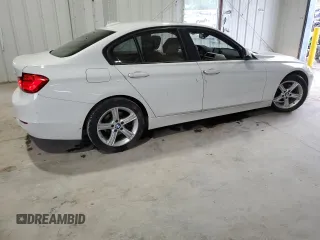 2013 BMW 3 Series 328i xDrive with VIN WBA3B3C58DF542088, listed as a Copart auction lot 52076465 with 85,222 mi miles and Salvage Title. Bid and sale history available at DreamBid. Image 3.