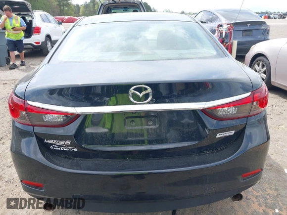 2016 Mazda 6 i Sport with VIN JM1GJ1U55G1461951, listed as a IAAI auction lot 41790268 with 98,567 mi miles and . Bid and sale history available at DreamBid. Image 16.