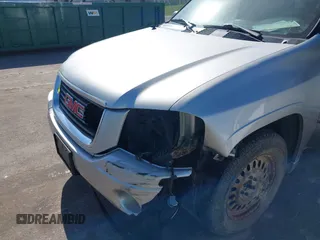 2004 GMC Envoy SLT z VIN 1GKDT13S642449872, wystawiony jako IAAI lot #42236157 z przebiegiem 205 194 mil mil oraz . Historia ofert i sprzedaży dostępna na DreamBid. Obrazek 6.