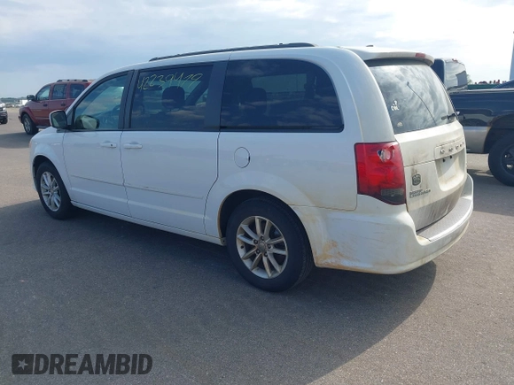 2016 Dodge Grand Caravan SXT with VIN 2C4RDGCG9GR380632, listed as a IAAI auction lot 42239479 with 197,316 mi miles and . Bid and sale history available at DreamBid. Image 3.