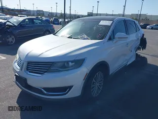2016 Lincoln MKX Select with VIN 2LMTJ6KR5GBL30010, listed as a IAAI auction lot 41741385 with 112,647 mi miles. Bid and sale history available at carsss.com. Image 2.