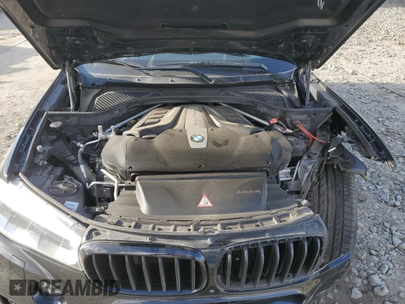 2017 BMW X5 xDrive50i with VIN 5UXKR6C54H0J84099, listed as a Copart auction lot 76269094 with 68,026 mi miles and Salvage title. Bid and sale history available at DreamBid. Image 12.