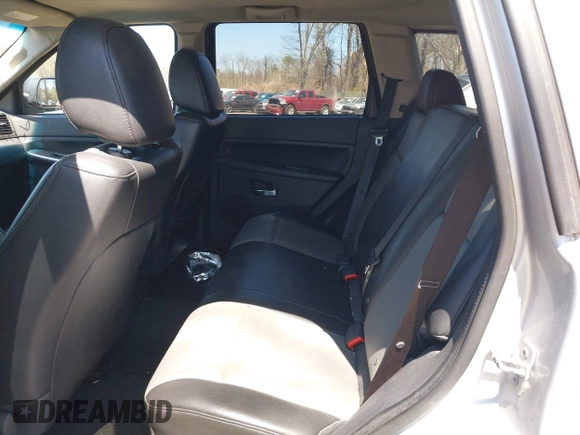 2010 Jeep Grand Cherokee Laredo with VIN 1J4PR4GKXAC141526, listed as a IAAI auction lot 41997559 with 0 mi miles. Bid and sale history available at carsss.com. Image 8.