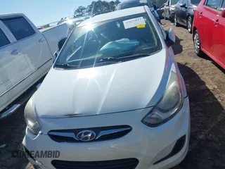 2014 Hyundai Accent GLS with VIN KMHCT4AE4EU590415, listed as a IAAI auction lot 41877817 with 169,285 mi miles. Bid and sale history available at carsss.com. Image 12.