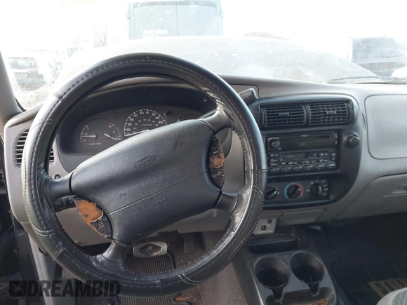 1999 Ford Ranger XLT with VIN 1FTYR14X0XPB77848, listed as a IAAI auction lot 41521029 with 139,595 mi miles. Bid and sale history available at carsss.com. Image 16.