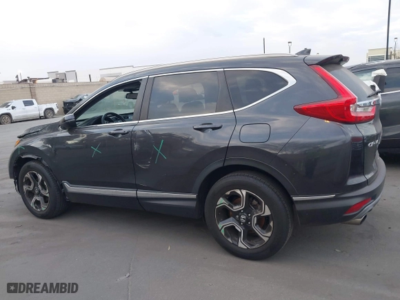 2019 Honda CR-V Touring with VIN 7FARW1H92KE014019, listed as a IAAI auction lot 41691555 with 32,635 mi miles. Bid and sale history available at carsss.com. Image 14.