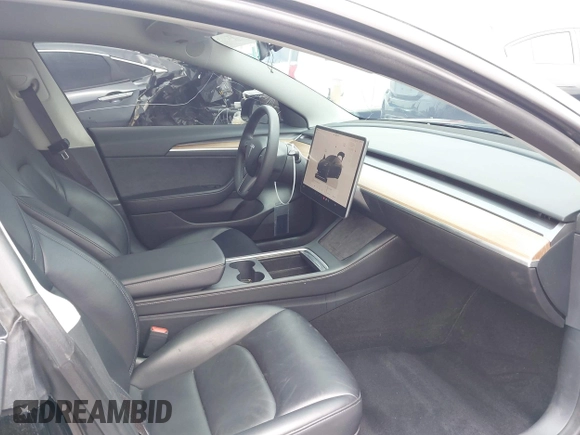 2023 Tesla Model 3 z VIN 5YJ3E1EAXPF604916, wystawiony jako IAAI lot #42461640 z przebiegiem 28 123 mil mil oraz . Historia ofert i sprzedaży dostępna na DreamBid. Obrazek 5.
