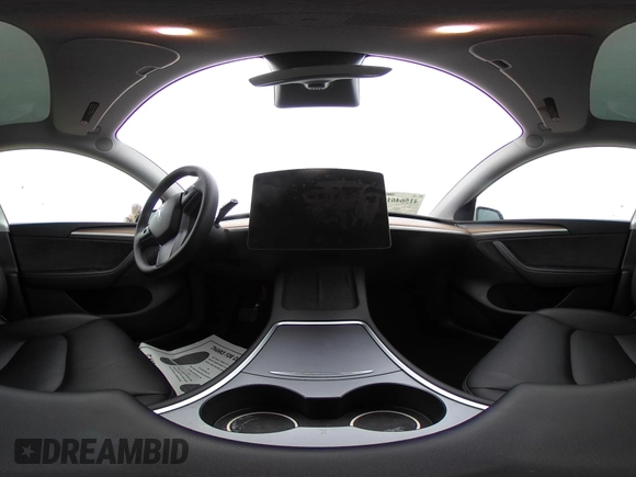 2023 Tesla Model Y Long Range z VIN 7SAYGDEEXPA181114, wystawiony jako IAAI lot #41564617 z przebiegiem 64 990 mil mil oraz . Historia ofert i sprzedaży dostępna na DreamBid. Obrazek 23.