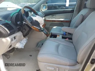2005 Lexus RX 330 с VIN 2T2GA31U55C027296, выставлен на аукционе Copart как лот 61410205 с пробегом 209 293 миль миль и Списание • Salvage title. История ставок и продаж доступна на DreamBid. Изображение 7.