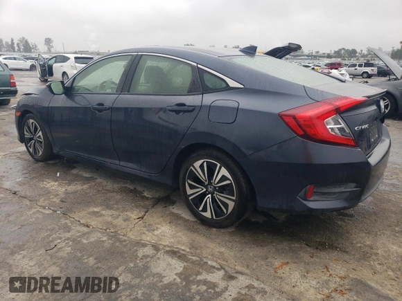 2018 Honda Civic EX-T z VIN JHMFC1F32JX006088, wystawiony jako Copart lot #50563105 z przebiegiem 117 744 mil mil oraz Szkoda całkowita • Salvage title. Historia ofert i sprzedaży dostępna na DreamBid. Obrazek 2.