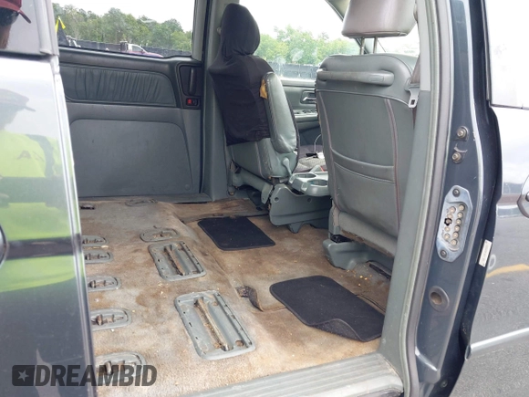2003 Honda Odyssey EX-L with VIN 5FNRL18963B059910, listed as a IAAI auction lot 42415037 with 267,600 mi miles and . Bid and sale history available at DreamBid. Image 8.