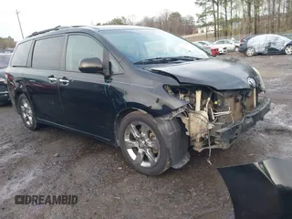 2015 Toyota Sienna SE with VIN 5TDXK3DC8FS561633, listed as a IAAI auction lot 41574795 with 256,187 mi miles. Bid and sale history available at carsss.com. Image 1.