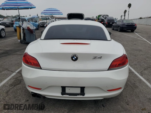2013 BMW Z4 sDrive28i with VIN WBALL5C5XDJ104078, listed as a Copart auction lot 76118864 with 103,587 mi miles and Salvage Title. Bid and sale history available at carsss.com. Image 6.