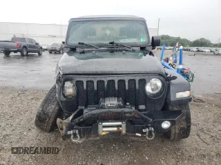 2020 Jeep Wrangler Sport S with VIN 1C4GJXAN7LW343890, listed as a Copart auction lot 63363335 with 74,179 mi miles and Salvage title. Bid and sale history available at DreamBid. Image 5.