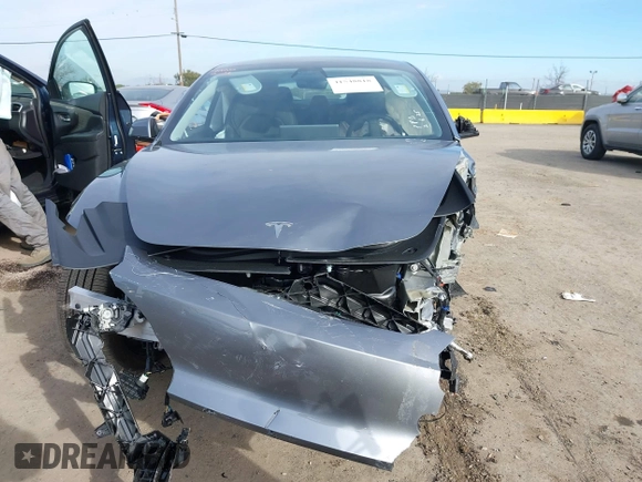 2025 Tesla Model 3 Long Range with VIN 5YJ3E1EB4SF873799, listed as a IAAI auction lot 41548818 with 2,129 mi miles and . Bid and sale history available at DreamBid. Image 12.