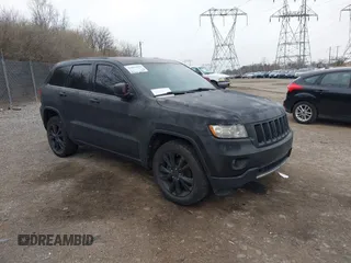 2013 Jeep Grand Cherokee Laredo with VIN 1C4RJEAG2DC573970, listed as a IAAI auction lot 41892914 with 185,050 mi miles. Bid and sale history available at carsss.com. Image 1.