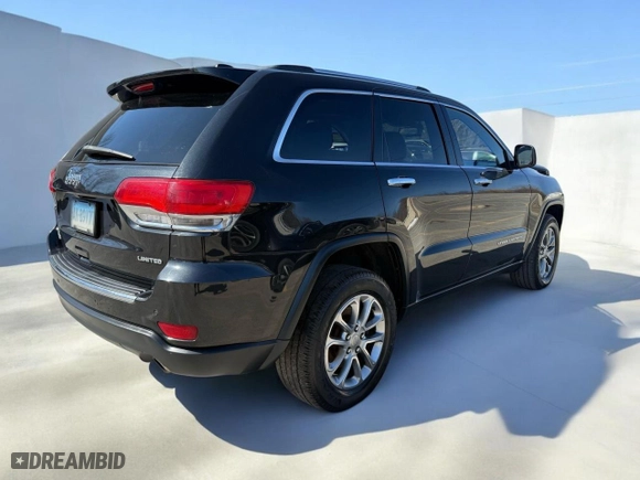 2015 Jeep Grand Cherokee Limited with VIN 1C4RJFBM4FC806566, listed as a Copart auction lot 49542775 with 143,770 mi miles and Clean Title. Bid and sale history available at carsss.com. Image 4.