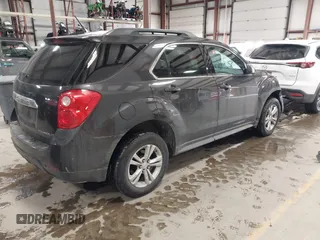 2015 Chevrolet Equinox LT z VIN 2GNALBEK7F6296532, wystawiony jako IAAI lot #41424368 z przebiegiem 152 174 mil mil oraz . Historia ofert i sprzedaży dostępna na DreamBid. Obrazek 4.