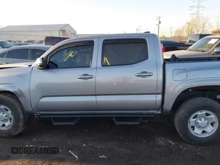 2021 Toyota Tacoma SR z VIN 3TMCZ5AN5MM386394, wystawiony jako IAAI lot #41821364 z przebiegiem 54 070 mil mil oraz . Historia ofert i sprzedaży dostępna na DreamBid. Obrazek 15.