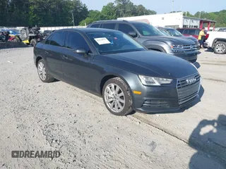 2017 Audi A4 Premium z VIN WAUGNAF48HN007757, wystawiony jako IAAI lot #42224054 z przebiegiem 92 802 mil mil oraz . Historia ofert i sprzedaży dostępna na DreamBid. Obrazek 1.