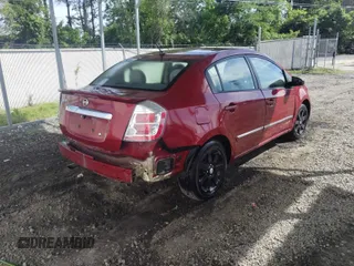 2012 Nissan Sentra 2.0 z VIN 3N1AB6AP9CL713129, wystawiony jako IAAI lot #42309760 z przebiegiem 143 699 mil mil oraz . Historia ofert i sprzedaży dostępna na DreamBid. Obrazek 4.