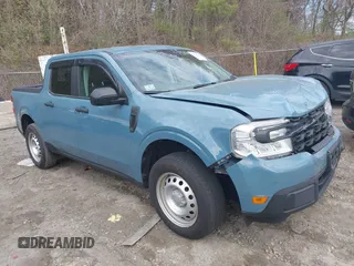 2023 Ford Maverick XL z VIN 3FTTW8E31PRA49554, wystawiony jako IAAI lot #42091514 z przebiegiem 28 687 mil mil oraz . Historia ofert i sprzedaży dostępna na DreamBid. Obrazek 1.