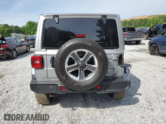 2021 Jeep Wrangler Unlimited Sahara Altitude with VIN 1C4HJXEN3MW691220, listed as a Copart auction lot 56334695 with 46,589 mi miles and Salvage title. Bid and sale history available at DreamBid. Image 6.