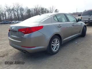 2013 Kia Optima LX with VIN 5XXGM4A79DG135066, listed as a IAAI auction lot 41915458 with 126,759 mi miles. Bid and sale history available at carsss.com. Image 4.