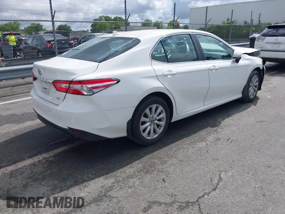 2019 Toyota Camry LE z VIN 4T1B11HKXKU237605, wystawiony jako IAAI lot #42248386 z przebiegiem 70 235 mil mil oraz . Historia ofert i sprzedaży dostępna na DreamBid. Obrazek 4.