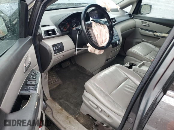 2012 Honda Odyssey EX-L with VIN 5FNRL5H64CB035196, listed as a Copart auction lot 71566704 with 243,529 mi miles and Salvage Title. Bid and sale history available at carsss.com. Image 8.