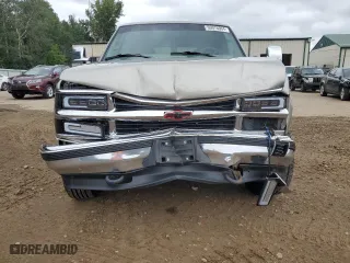 1999 Chevrolet Suburban with VIN 1GNGK26J0XJ439859, listed as a Copart auction lot 69076004 with 277,201 mi miles and Salvage Title. Bid and sale history available at carsss.com. Image 5.