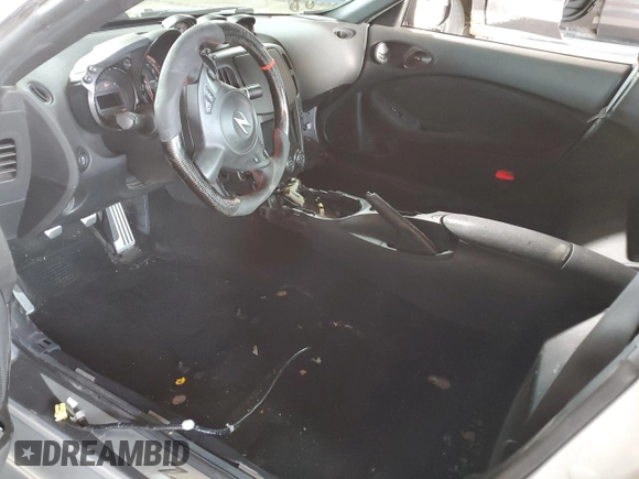 2015 Nissan 370Z Nismo z VIN JN1AZ4EH1FM441060, wystawiony jako Copart lot #53423725 z przebiegiem Nie podano mil oraz Szkoda całkowita • Salvage title. Historia ofert i sprzedaży dostępna na DreamBid. Obrazek 7.