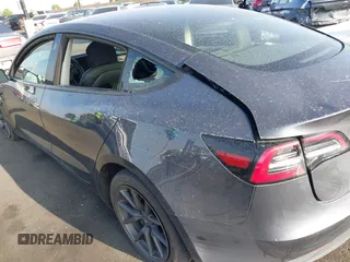 2023 Tesla Model 3 with VIN 5YJ3E1EA4PF427022, listed as a IAAI auction lot 42465964 with 169,346 mi miles and . Bid and sale history available at DreamBid. Image 6.