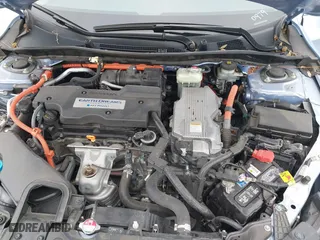 2017 Honda Accord Hybrid with VIN JHMCR6F32HC010979, listed as a IAAI auction lot 41359613 with 29,823 mi miles. Bid and sale history available at carsss.com. Image 10.