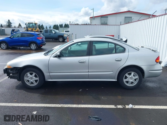 2003 Oldsmobile Alero GL1 z VIN 1G3NL52F93C310114, wystawiony jako IAAI lot #41778264 z przebiegiem Nie podano mil oraz . Historia ofert i sprzedaży dostępna na DreamBid. Obrazek 14.