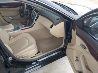 2009 Cadillac CTS RWD w/1SB with VIN 1G6DU57V290147277, listed as a IAAI auction lot 41995209 with 120,576 mi miles. Bid and sale history available at carsss.com. Image 5.