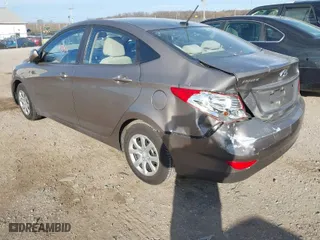 2013 Hyundai Accent GLS with VIN KMHCT4AEXDU464526, listed as a IAAI auction lot 41904354 with 157,368 mi miles. Bid and sale history available at carsss.com. Image 3.