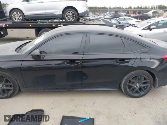 2024 Honda Civic Sport with VIN 2HGFE2F51RH594148, listed as a IAAI auction lot 41304184 with 11,307 mi miles and . Bid and sale history available at DreamBid. Image 14.