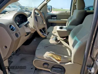 2007 Ford F-150 XLT with VIN 1FTRW12W37KB03263, listed as a Copart auction lot 61087375 with 167,585 mi miles and Salvage title. Bid and sale history available at DreamBid. Image 7.