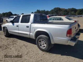 2003 Dodge Dakota SLT with VIN 1D7HL48X33S340079, listed as a Copart auction lot 76516514 with 295,350 mi miles and Clean Title. Bid and sale history available at carsss.com. Image 2.