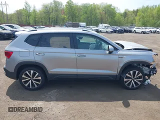 2023 Volkswagen Taos SE z VIN 3VVEX7B24PM342309, wystawiony jako IAAI lot #42138958 z przebiegiem 18 787 mil mil oraz . Historia ofert i sprzedaży dostępna na DreamBid. Obrazek 13.