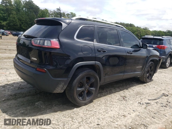 2019 Jeep Cherokee Latitude Plus with VIN 1C4PJMLB7KD101158, listed as a Copart auction lot 58246115 with 144,807 mi miles and Salvage title. Bid and sale history available at DreamBid. Image 3.