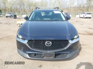 2021 Mazda CX-30 Premium with VIN 3MVDMBDM4MM238367, listed as a IAAI auction lot 42124335 with 31,120 mi miles and . Bid and sale history available at DreamBid. Image 12.