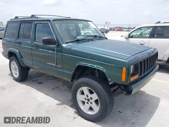 1999 Jeep Cherokee Sport z VIN 1J4FT68S1XL667138, wystawiony jako IAAI lot #42651020 z przebiegiem 200 324 mil mil oraz . Historia ofert i sprzedaży dostępna na DreamBid. Obrazek 1.