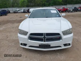 2014 Dodge Charger SE with VIN 2C3CDXBG4EH186881, listed as a IAAI auction lot 41952966 with 206,057 mi miles and . Bid and sale history available at DreamBid. Image 12.