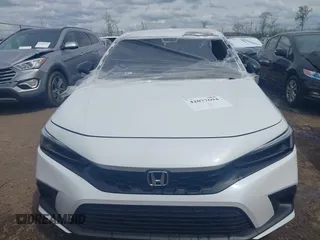 2023 Honda Civic Sport with VIN 19XFL2H80PE022752, listed as a IAAI auction lot 42077694 with 25,939 mi miles and . Bid and sale history available at DreamBid. Image 12.