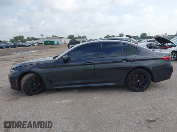 2021 BMW 5 Series 540i with VIN WBA53BJ03MCG98664, listed as a IAAI auction lot 42488708 with 64,101 mi miles and . Bid and sale history available at DreamBid. Image 13.