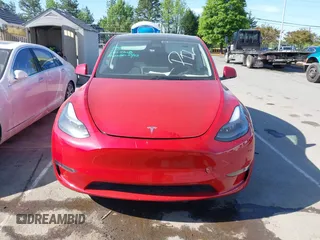 2023 Tesla Model Y Long Range with VIN 7SAYGDEEXPA182702, listed as a IAAI auction lot 42023730 with Not provided miles and . Bid and sale history available at DreamBid. Image 12.